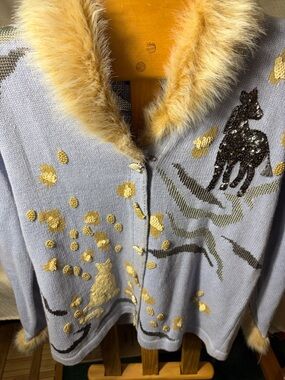 Storybook Knits beautiful cat sweater with faux fur collar and cuffs